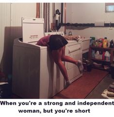 a woman leaning on an appliance in a kitchen with the caption, when you're a strong and independent woman, but you're short