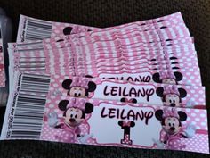 minnie mouse birthday party favors with pink polka dots and mickey mouse name tags on them