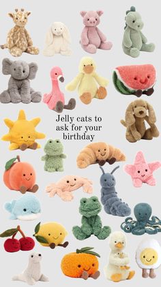 a bunch of stuffed animals that are in the shape of an animal with words on it