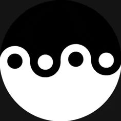 a black and white circle with three circles in it