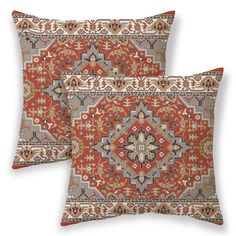 two pillows with an orange and blue pattern on the front, one in grey and red