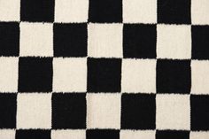 a black and white checkered fabric with small squares