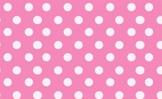 a pink background with white polka dots