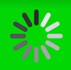 a green screen with white and black circles