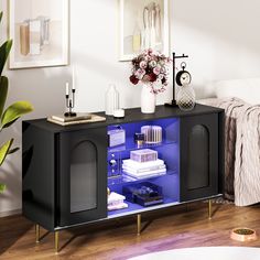 a black and blue cabinet in a white room