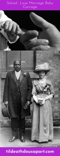 two people standing next to each other in front of a building