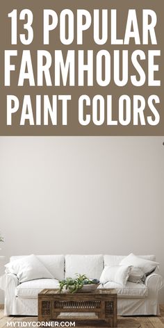 a white couch sitting on top of a wooden floor in front of a wall with the words 13 popular farmhouse paint colors