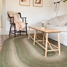 a living room with two chairs and a coffee table