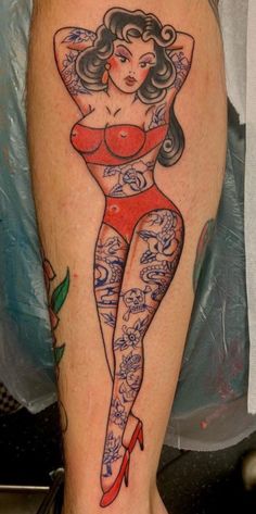 a woman with tattoos on her legs is shown in this tattoo artist's photo