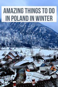 an aerial view of houses and mountains with the words amazing things to do in poland in winter