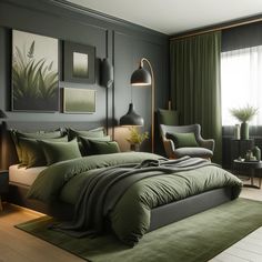 a bedroom with green bedding and pillows on the floor next to a large window