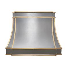 a stainless steel and wood range hood with gold trimmings on the side,