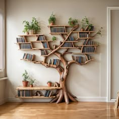 a tree with bookshelves and potted plants on the shelves in front of it