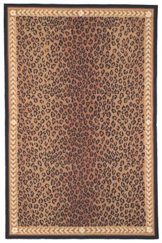 a leopard print rug with black border