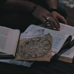 an open book sitting on top of a table