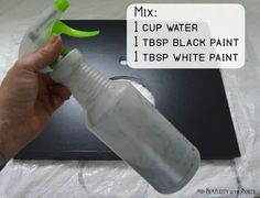 a hand is holding a bottle with white paint on it, and the text below reads mix cup water 1 tbp black paint 1 tbbp white paint