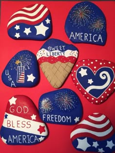 some patriotic rocks with the words america written on them