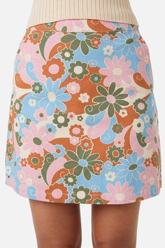 Retro printed drill mini skirt - a gorgeous psychedelic floral brimming with cool retro vibes - crafted of a mid weight cotton drill fabric - highwaisted a-line fit - side pockets - length finishes above the knee - button and hidden zipper on the centre back - available in blue Product Code: PGFU203109 Blue Retro Cotton Skort, Retro Blue Cotton Skort, Spring Retro Blue Skort, Retro Blue Skort For Spring, Floral Print Mini Skort, Retro Floral Print Mini Skirt For Spring, Retro Mini Skirt With Floral Print, Retro Floral Print Mini Skirt, Retro Cotton Mini Skirt For Spring