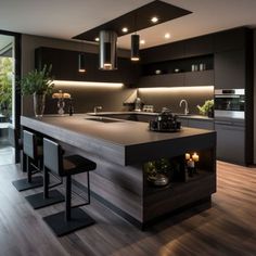 a modern kitchen with an island and bar stools