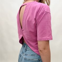 Show Off Your Playful Side In Our Open Back Tee. Made With Lightweight Fabric And A Bold Magenta Color, This Top Is Perfect For Yoga Or Pairing With Denim. Embrace The Unexpected With Our Unique Design. Don't Miss Out On This Must-Have Piece! Contents: Cotton Blend Imported Everyday Purple Short Sleeve Tops, Pink Fitted Tops For Everyday, Pink Crew Neck Top For Day Out, Fitted Pink Top For Everyday, Chic Cotton Crop Top T-shirt, Purple Tops For Everyday Spring Wear, Purple Everyday Spring Top, Purple Everyday Spring Tops, Trendy Purple Everyday Top