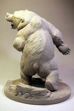 a statue of a polar bear standing on its hind legs