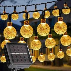 solar powered christmas lights hanging from a string