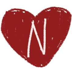 a red heart with the letter n painted on it