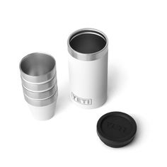 the yeti cup is next to three cups with lids on them and one has a black lid