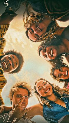 a group of young people standing together in front of a sky background with the words friends on it