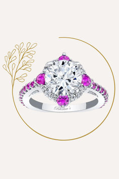 a diamond and pink sapphire ring on a white background with a gold circle around it