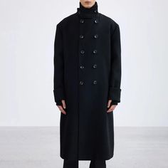 Sleek Buttoned Wool Overcoat - chiclara Classic Black Long Pea Coat, Classic Long Black Pea Coat, Modern Black Pea Coat For Winter, Black Tailored Winter Outerwear, Modern Long Outerwear For Fall, Spring Black Wool Pea Coat, Tailored Black Winter Outerwear, Oversized Black Business Outerwear, Black Wool Coat With Stand Collar For Work