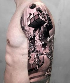 a man's half sleeve with an image of a cube on it