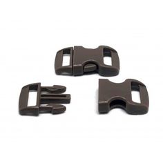 three black plastic buckles on white background