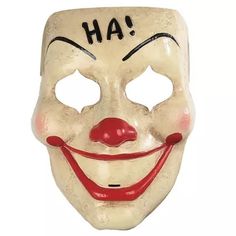 a mask with the words ha written on it's face and smiling clown nose