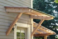 Diy Awnings, Porch Overhang, Diy Awning, Building A Door, Porch Roof, Garage Remodel, Door Canopy