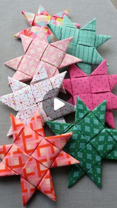 several different types of origami stars on a table