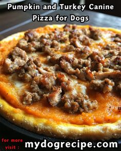 there is a pizza with meat and cheese on it