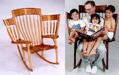 an old man sitting in a chair with two young children on his lap while reading a book