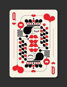 a playing card with red and black designs on it