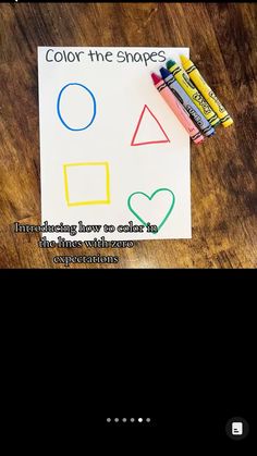 a piece of paper that has some crayons on it with the words color the shapes