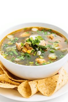 This broth-based chicken poblano soup recipe is made with tender cubes of chicken, mild poblano peppers and sweet corn. Ideal for freezing or prepping ahead, it's even better garnished with a lime wedge, fresh cilantro and tortilla chips. Poblano Soup Recipe, Beef Bourguignon Slow Cooker, Easy Beef Bourguignon, Chicken Poblano Soup, Savory Soup Recipes, Chicken Poblano, Poblano Soup, Poblano Peppers Recipes, Slow Cooker Vegetarian Chili