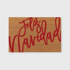 a door mat with the words feli's navidad written on it