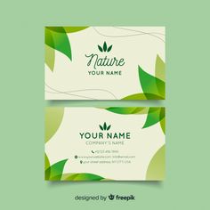 two business cards with green leaves on them