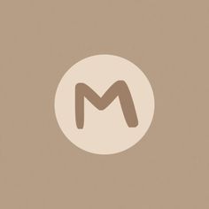 the letter m in a white circle on a brown background