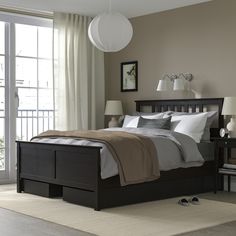 HEMNES bed frame with 4 storage boxes, black-brown/Lyngör dark gray, Queen. HEMNES bed frame is a timeless beauty in solid wood with storage drawers that keep things close by – and LYNGÖR mattress base gives extra height and helps your mattress keep its shape for longer. Leg/ Headboard/ Bedside/ Top rail/ Middle rail: Solid pine. Black Wood Bed Frame, Warming Blanket, Ikea Hemnes Bed, Black Beds, Hemnes Bed, Bed Frame Legs, Headboard Bedroom, Black Bed Frame, Black Bed