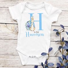 Make your little one the star in this personalised blue bunny rabbit baby vest. Crafted with love and care, it's the perfect outfit for baby's first adventures! 👶💙 #personalisedbabyvest #babyboyoutfit #bluebunnyrabbit #newbornessentials #babylove #AmazonUK #Hoolaroo Rabbit Face, Rabbit Design, Baby Boy Gift, Newborn Baby Boy, Baby Blue Colour