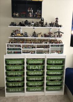 a shelf filled with lots of toys and legos