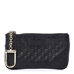 The Gucci Microguccissima Key Chain Coin Pouch In Black Is Crafted From An Embossed Calfskin Leather In Italy. This Zip Wallet Coin Pouch Features The Interlocking Gg Pattern, Gucci Logo, And Interior Key Chain. Black Microguccissima Key Chain Coin Pouch Gold-Tone Hardware 100% Calfskin Leather Top Zip Closure Embossed Microguccissima Pattern Gucci Logo Interior Key Chain 6" X 3.25" X 0.65" Chain Drop 2.75 Key Ring 1.5" X 1" Product Number 544248 Made In Italy Elegant Black Bag With Logo Charm, Luxury Black Coin Purse With Interior Key Chain Holder, Luxury Black Bag With Logo Charm, Gucci Wallets With Gold-tone Hardware For Formal Use, Gucci Wallet With Gold-tone Hardware For Formal Occasions, Gucci Wallets With Gold-tone Hardware For Formal Occasions, Gucci Black Bag As Gift, Black Gucci Bag As Gift, Louis Vuitton Clemence Wallet