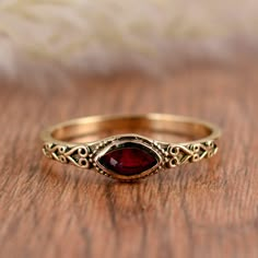 "Handmade item Garnet  Ring,Handmade Ring,Unique Ring,Vintage Ring,Boho Ring,Anniversary Ring,Wedding Ring,Gift Ring,Deco Ring,Gift For Her  Product    :-  ring Material   :-  Brass, silver    ? Add this beautiful one little thing of galactic shine to make you feel unique and to transform your lives. Perfect for any kind of outfit and every occasion. ? Customers satisfaction is our biggest priority, please contact us with any questions/queries for future or existing orders, and we will do our best to make sure you are happy with your order. ?Please make sure to add the correct address during check out. You can return your purchased item within 15 days after successful delivery. We offer a 100% \"Money Back Guarantee\" if you are not satisfied with your purchase. Return charges will be paid Red Stone Ring, Unique Rings Vintage, Minimal Ring, Zierlicher Ring, Ring Inspo, Garnet Jewelry, Garnet Ring, Funky Jewelry, Deco Ring