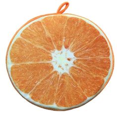 an orange cut in half on a white background